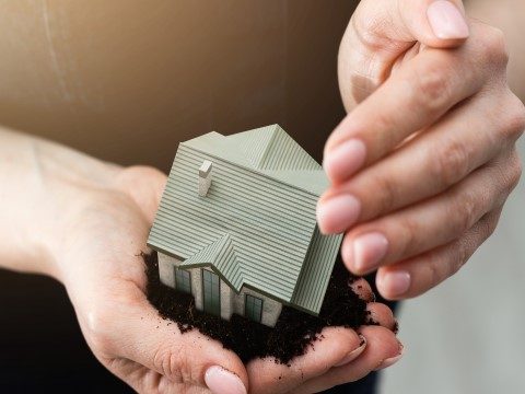 woman hands holding paper house, model woman hands holding paper house, model.